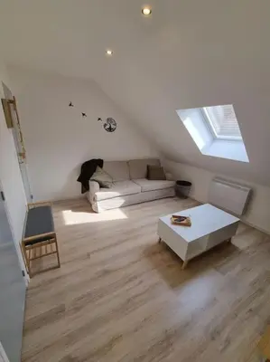 Un ou plusieurs lits dans un hébergement de l'établissement Cosy appartement proche Disneyland