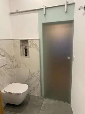 Salle de bains dans l'établissement Les Hortensias
