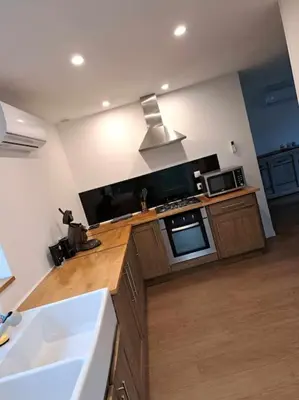 Cuisine ou kitchenette dans l'établissement Gîte des deux L