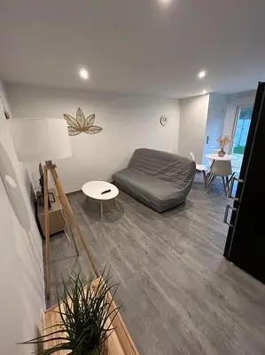 Coin salon dans l'établissement Au Petit Faubourg