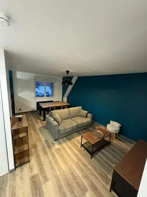 Coin salon dans l'établissement Appartement Cosy dans le coeur de Witry-les-Reims