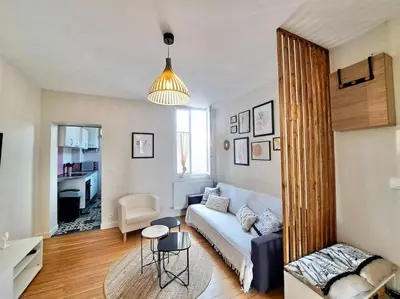 Coin salon dans l'établissement Appartement Cosy