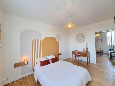 Un ou plusieurs lits dans un hébergement de l'établissement Appartement Cosy