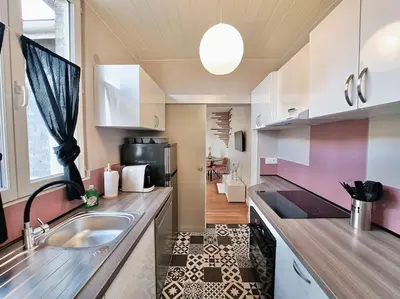 Cuisine ou kitchenette dans l'établissement Appartement Cosy