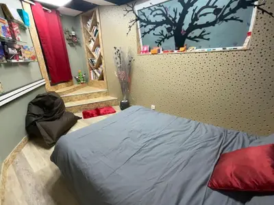 Un ou plusieurs lits dans un hébergement de l'établissement Logement 4 personnes avec cuisine équipée et parking clos
