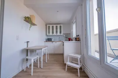 Cuisine ou kitchenette dans l'établissement Le Clovis - Cathédrale