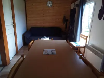 Un ou plusieurs lits dans un hébergement de l'établissement chalet tout équipé