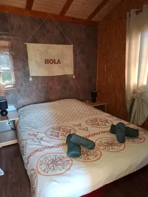 Un ou plusieurs lits dans un hébergement de l'établissement chalet tout équipé