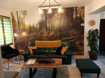 Coin salon dans l'établissement Le chêne BuBu