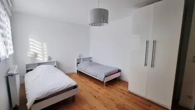 Un ou plusieurs lits dans un hébergement de l'établissement Superbe Maison avec jardin