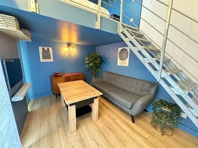Coin salon dans l'établissement Landouzy maison centre ville