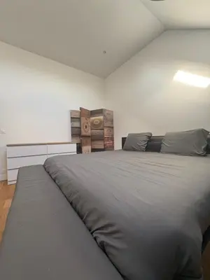 Un ou plusieurs lits dans un hébergement de l'établissement Le 7 - Appartement Cosy - Disney 20 min