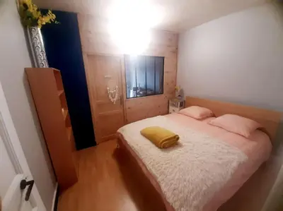 Un ou plusieurs lits dans un hébergement de l'établissement Maison de ville au centre de Fismes