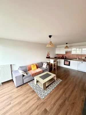 Cuisine ou kitchenette dans l'établissement Appartement chaleureux - Meaux