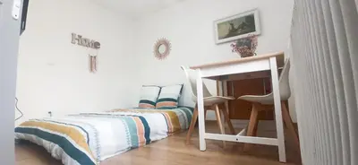 Un ou plusieurs lits dans un hébergement de l'établissement Appartement T2 au 1er étage