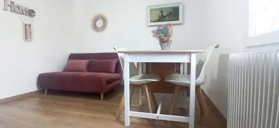 Coin salon dans l'établissement Appartement T2 au 1er étage