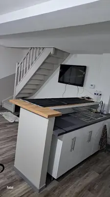 Cuisine ou kitchenette dans l'établissement maison pas loin centre-ville
