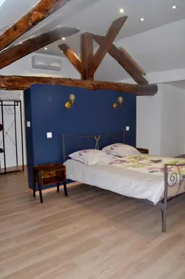 Un ou plusieurs lits dans un hébergement de l'établissement Les Gîtes de Monthermé L'Appartement belvédère sur Monthermé