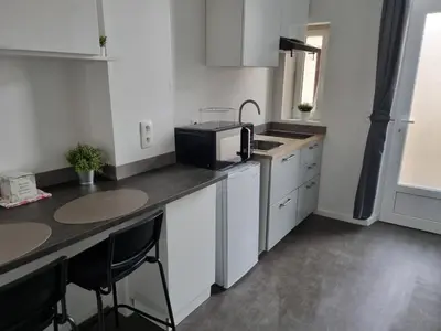 Cuisine ou kitchenette dans l'établissement La Fourmi