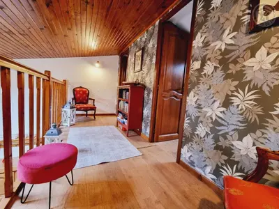 Coin salon dans l'établissement Gîte chaleureux en plein cœur de la nature avec terrasse, animaux acceptés, proche Val Joly - FR-1-510-183