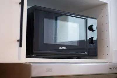 Télévision ou salle de divertissement dans l'établissement Studio Détente 2 pers wifi gare