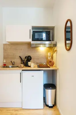 Cuisine ou kitchenette dans l'établissement Studio Relax 2pers wifi