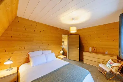 Un ou plusieurs lits dans un hébergement de l'établissement Cottage 3 chambres - Chaleureux chalet pour 6