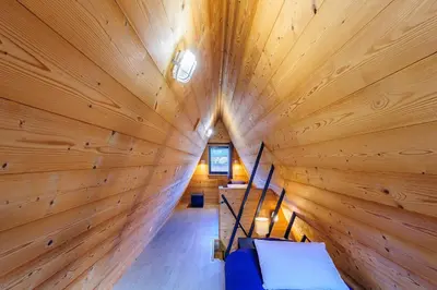 Un ou plusieurs lits dans un hébergement de l'établissement Cottage 2 chambres - Chalet climatisé pour 4
