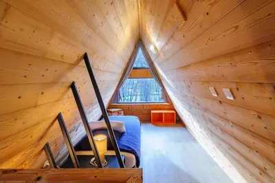 Coin salon dans l'établissement Cottage 2 chambres - Chalet climatisé pour 4