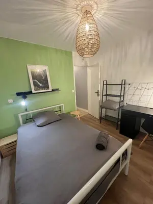 Un ou plusieurs lits dans un hébergement de l'établissement Greyellow Compiegne
