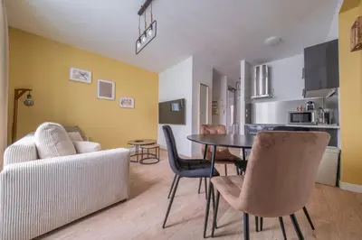 Cuisine ou kitchenette dans l'établissement Le Boulingrin - 4 apartments