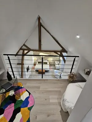 Un ou plusieurs lits dans un hébergement de l'établissement La Suite Arbane SPA & sauna - Avarum