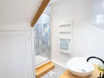 Salle de bains dans l'établissement Bel appartement à 10 minutes de Disney
