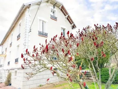 Jardin de l'établissement Bel appartement à 10 minutes de Disney