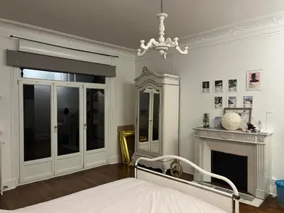 Un ou plusieurs lits dans un hébergement de l'établissement Maison de maître dans un village à la campagne