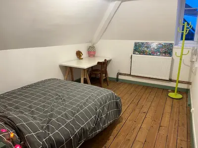 Un ou plusieurs lits dans un hébergement de l'établissement Maison de maître dans un village à la campagne
