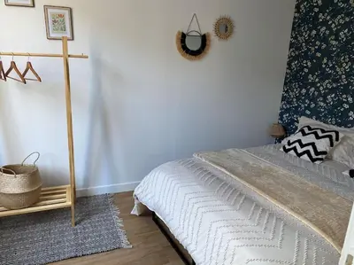 Un ou plusieurs lits dans un hébergement de l'établissement Maison de charme