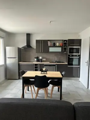 Cuisine ou kitchenette dans l'établissement La grange