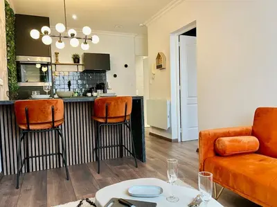 Coin salon dans l'établissement Floréa Reims avec du charme proche gare et centre