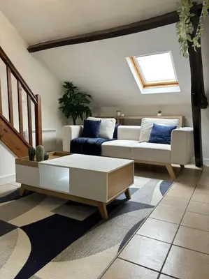 Coin salon dans l'établissement L appart'