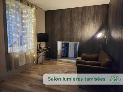 Coin salon dans l'établissement Logement cocooning 2-4 personnes avec Salle de jeux