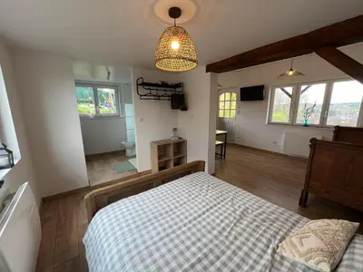 Un ou plusieurs lits dans un hébergement de l'établissement le chalet du bonheur