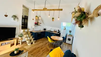Télévision ou salle de divertissement dans l'établissement Logement cosy et confortable.