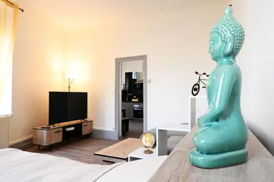 Télévision ou salle de divertissement dans l'établissement Charmant petit pont Ardennais/cosy/T1/wifi/parking