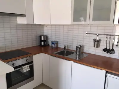 Cuisine ou kitchenette dans l'établissement Magic Apartments
