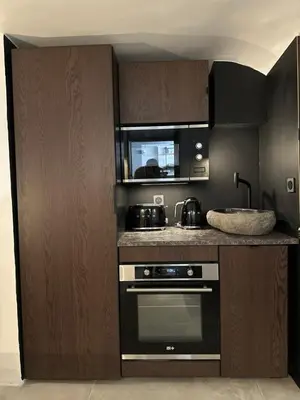 Cuisine ou kitchenette dans l'établissement Studio luxe dans le vignoble