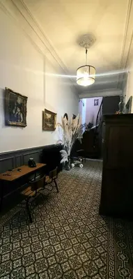Télévision ou salle de divertissement dans l'établissement La Villa Beausejour