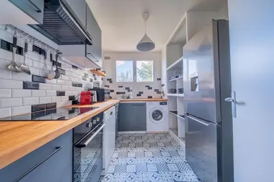 Cuisine ou kitchenette dans l'établissement Trioasis - 3 chambres