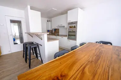 Cuisine ou kitchenette dans l'établissement La Rouette - Chambres privées