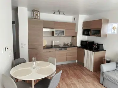 Cuisine ou kitchenette dans l'établissement Lovely Flat
